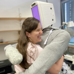 Alexis and her HuggieBot