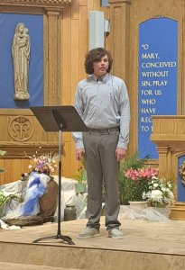 Sam performs at church