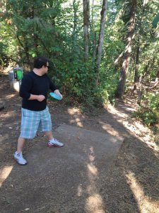 Enjoying disc golfing