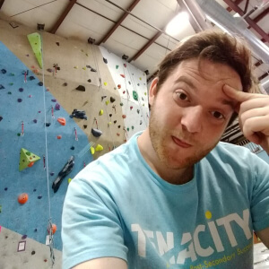 Coding teacher Tyler rock climbing
