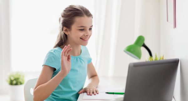Girl in teal shirt making decisions online