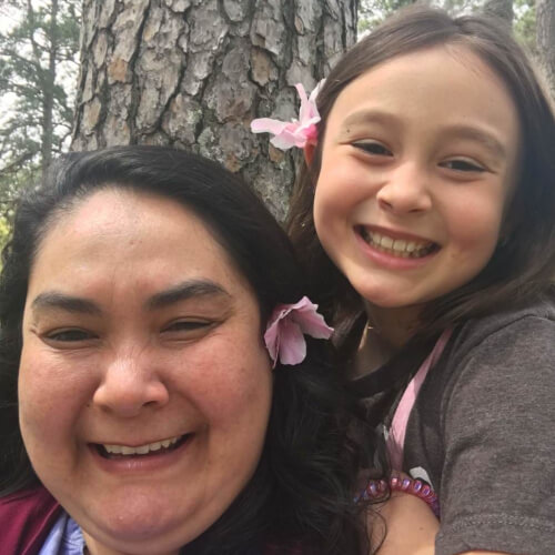 Student Spotlight Ellah and Mom Smiling