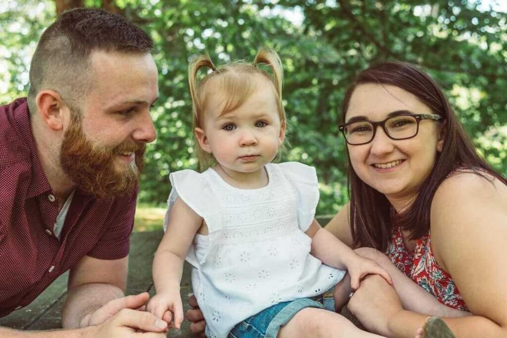 Brandon with daughter and wife