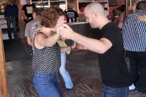 Justin and his wife dancing