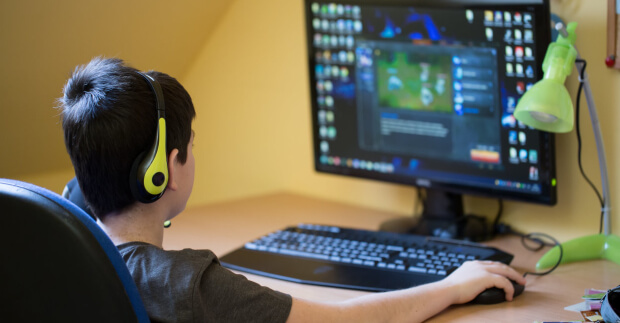 Boy playing javascript games
