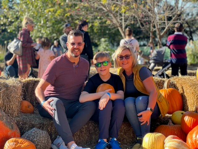 Myles and parents at pumpkin patch