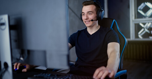 Student playing minecraft on computer