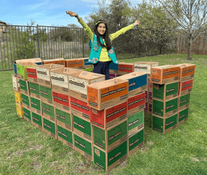 Emma sells over 1,000 boxes of Girl Scout cookies!